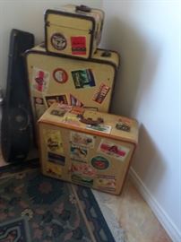 Vintage Luggage with Travel Stamps