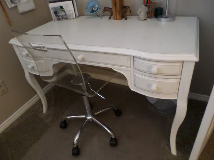White 5 drawer desk, lucite desk chair on casters