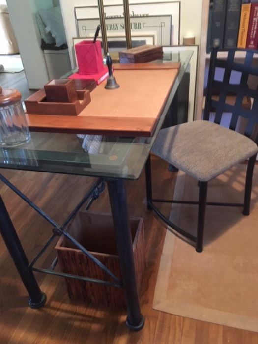 Glass topped desk with metal legs