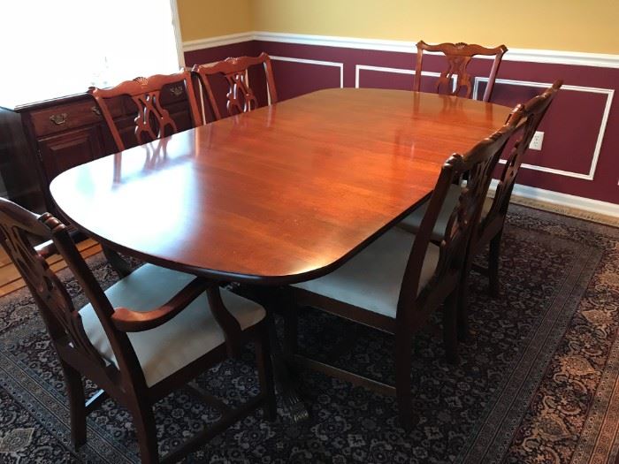 Cherry Dining Table with 6 Chairs (2 Captain), Leaves and Pads.