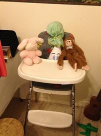 High chair and stuffed animals