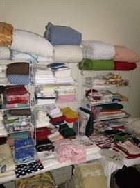 Many blankets and linens