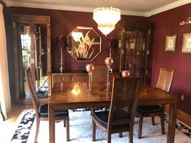 Henredon dining set. Caneback chairs (6 in total - 2 armchairs not shown), 2  lighted glass shelf units, 1 buffet with drawers and center cabinet, 2 leaves, table pads.  $1195