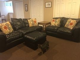 Well loved leather sofa - 2 parts of a sectional (corner piece is gone).  includes ottoman but not kitty cat.