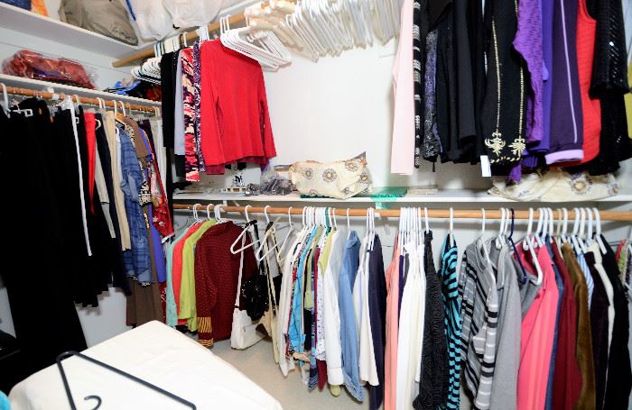Lots of clothes and some new with tags for sale along with shoes and purses and jewelry. The clothes are like new in this immaculate home. 