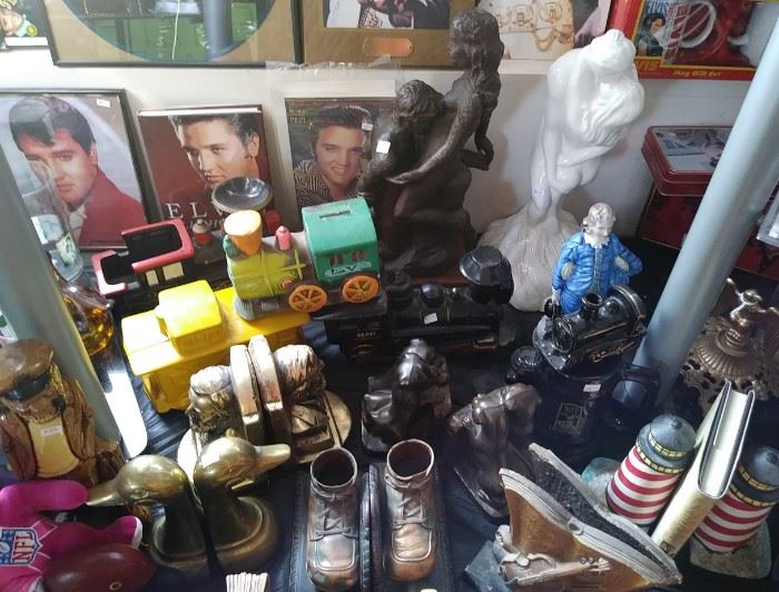 Vintage book ends....Elvis items...Statues...Train banks and more