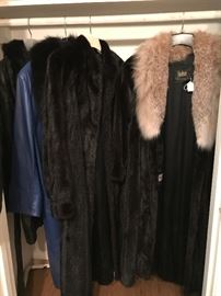 [left] Bill Robinson Mink coat. One color. $400    [right] Koslow's (The most trusted name in furs) Mink coat. Two colors. $500