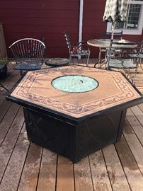 Tiled propane fire pit with glass rocks