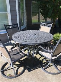 Metal patio set with 6 chairs