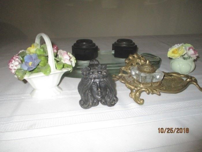 few ink wells table set in back dated 1907 and flower baskets 