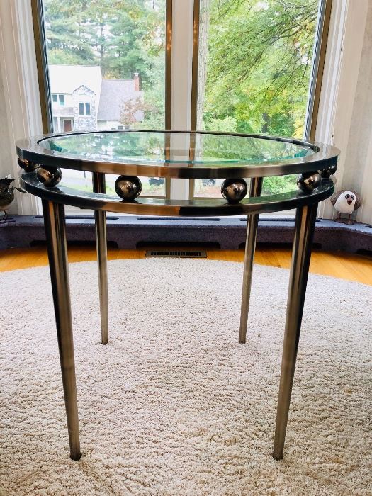 Round, glass top accent table