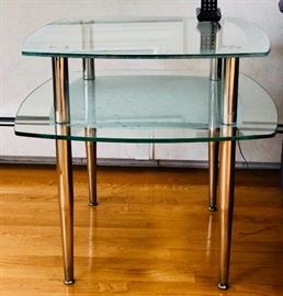 Contemporary, two-tiered, water drop table