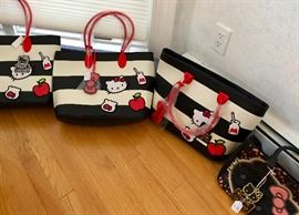 Lots of Hello Kitty handbags, totes and clothing!