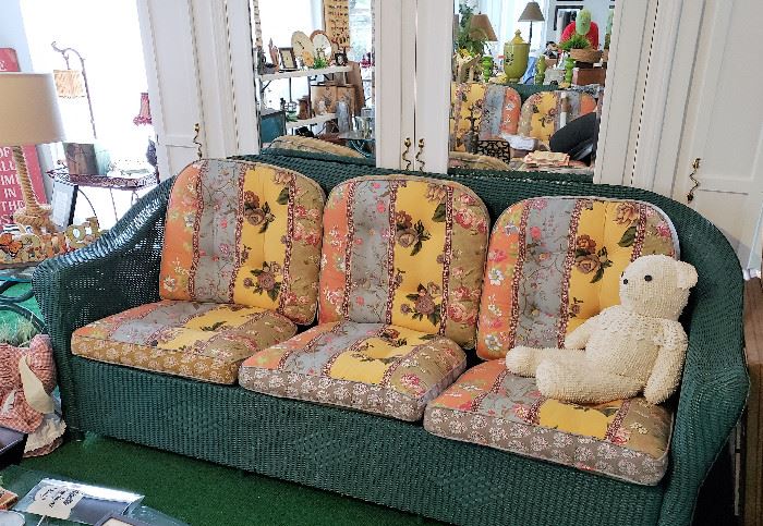 wicker sofa with cushions