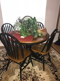 Lovely wood table with four chairs in excellent condition