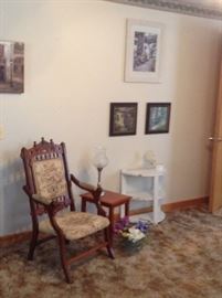 Ornate carved tapestry chair, side tables, art work, lamps