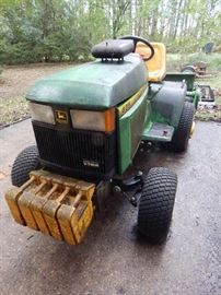 John Deere with loads of accessories!!! A real deal at $3200.