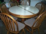 Oak ceramic tile table/leaf/and 6 chairs (shown without leaf).