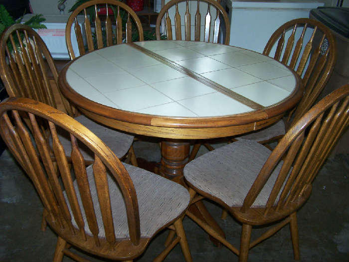 Oak ceramic tile table/leaf/and 6 chairs (shown without leaf).