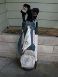 This set has Callaway drivers and Macgregor irons in good shape. There are other golf items including some new Royal golf shoes 10M. and 22 doz. assorted golf balls.