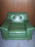 Retro vinyl stationary chair that is the mate to the couch, 37" wide in good condition.