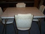 Table & chairs set straight from the 60's, metal legs, has 6 chairs and leaf.