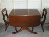 Mahogany drop leaf table and 4 chairs, cloth covered seats looks very good!