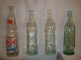 Big Chief soda bottles and other unique bottles and glass.