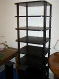 black electronic shelving unit