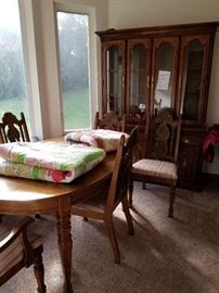 Dining room set. China hutch, table with one leaf, 6 upholstered chairs