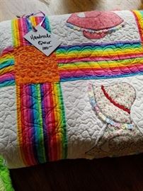 Handmade Sue Bonnet quilt. Barely used. Made in the early 1990's
