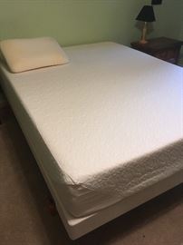 Queen temperpedic bed. Was covered, firm 