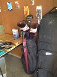 golf clubs and bags