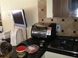 Toaster oven, not sure if the TV is for sale or not