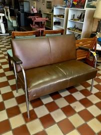 Vintage Brown Vinyl Settee with Chrome Legs and Padded Arm Rests
