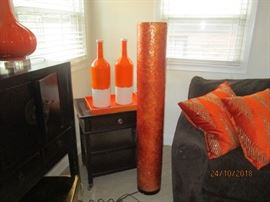 Orange vases and tall orange lamp