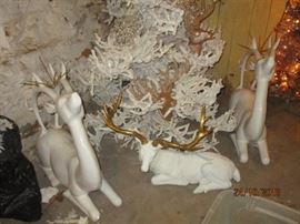 Porcelain reindeer and flocked Christmas tree