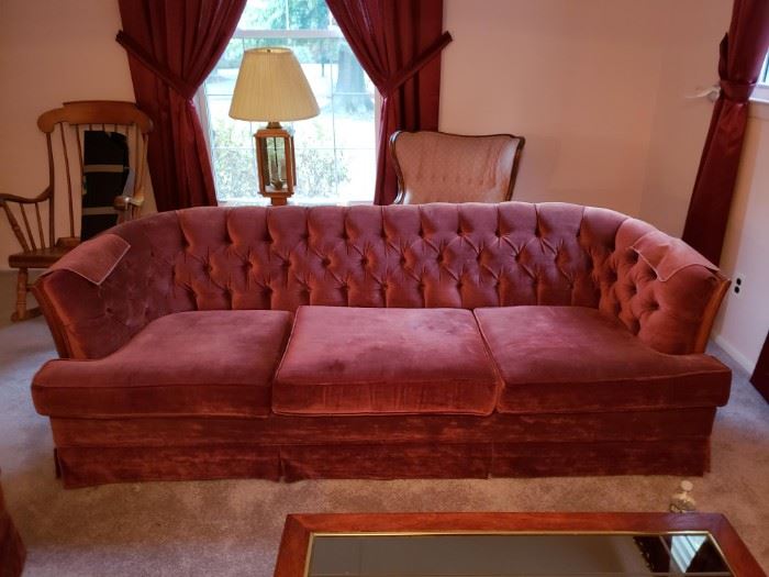 Burgundy  Sofa  with Wood Trim Gorgeous in excellent condition.  Dimensions: 36 x 82 x 28 