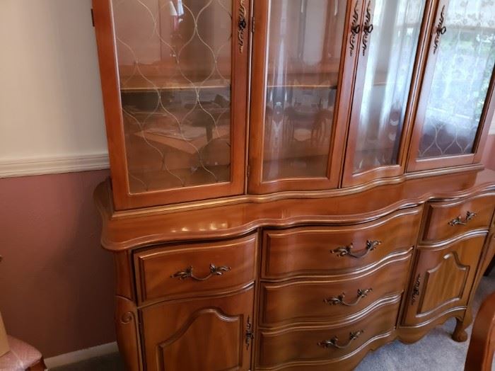 French Provincial Break Front and Hutch. Dimensions are 62 x 20 x 32.  Hutch is:  58 x 45 x 12