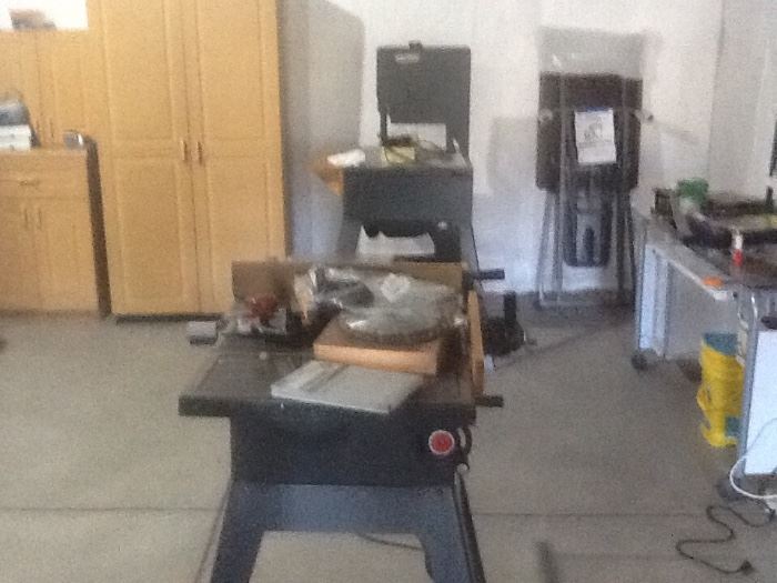 Table Saw, Jig Saw, lots of Tools and Cabinets.