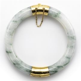 A jade, 14k hinged bangle bracelet