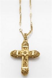 collection of gold cannetille jewelry items