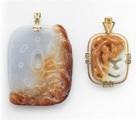 collection of two carved jade, 14k pendants