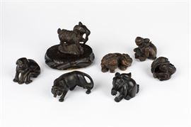 group of seven carved hardwood netsuke