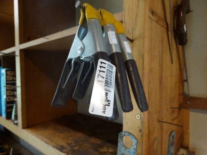 3 clamps, various saws and a butcher knife.