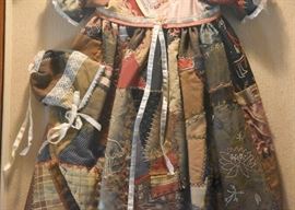 $150 - Handmade Crazy Quilt Children's Dress & Hat in Shadow Box (Approx. 24" L x 33.75" H)
