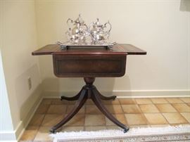 leather top drop leaf table, Birmingham silver tea service and candelabras