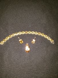 Citrine in 10K ear rings and pendent 