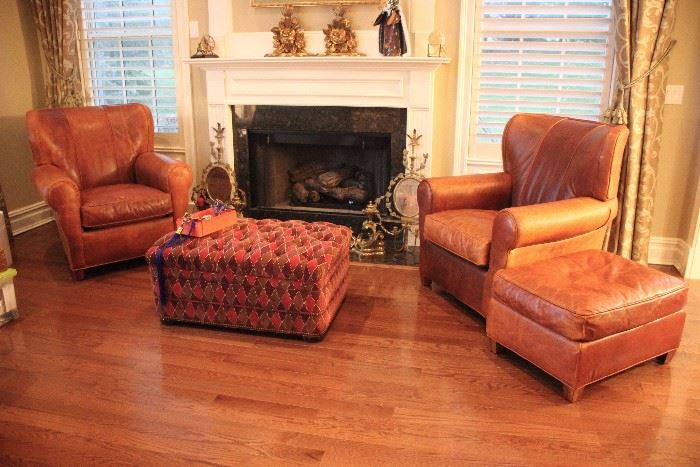 Pair Tommy Bahama leather arm chairs & ottoman