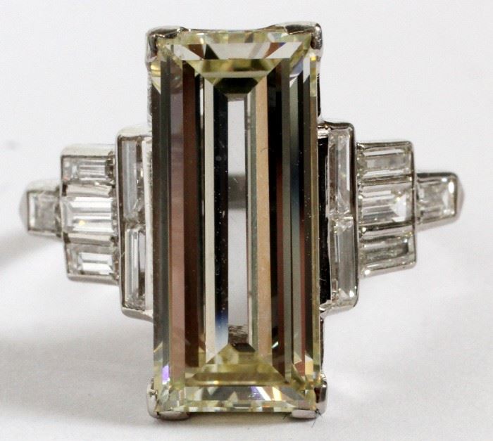 EMERALD CUT 3.60 CT. DIAMOND RING WITH 12 BAGUETTES DIAMONDS
Lot # 2064  